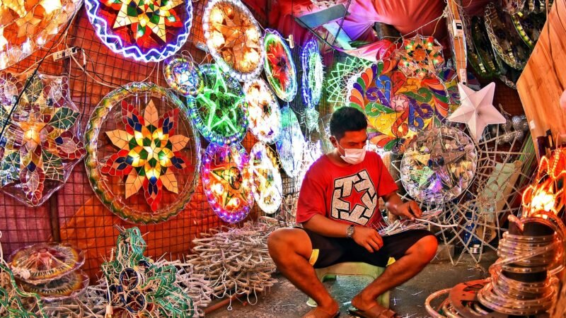 Filipino parol maker at work during the 13th month pay season