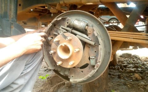 Mechanic working on a brake, a skill tested in a TESDA NC assessment