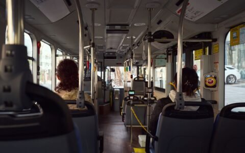 Passengers seated inside a city bus