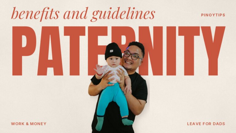Paternity leave: smiling man holding baby